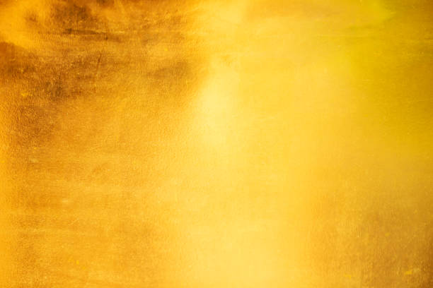 istock Gold abstract background or texture and gradients shadow 1284407147