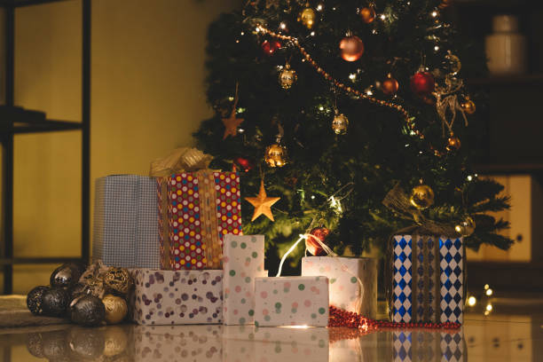 istock Christmas decoration with ornaments-decorated Christmas tree and presents 1284412126