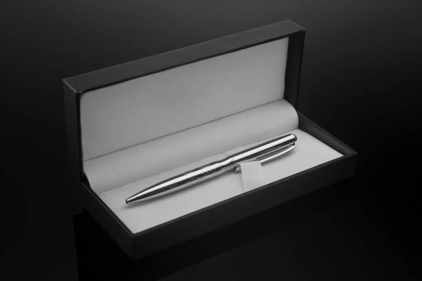 istock Men's ballpoint pen in a gift case on a dark background. Concept. 1284412974