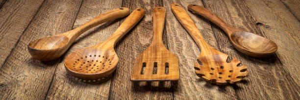istock wooden kitchen cooking utensils set 1284413883