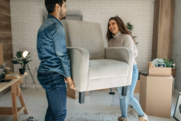 istock Couple planing how to decorate apartment 1284414032