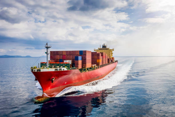 istock A loaded cargo container ship traveling over calm sea with speed 1284416155