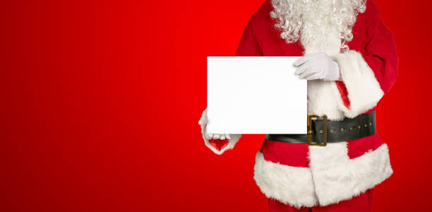 santa holds an blank white panel for advertising into the camera