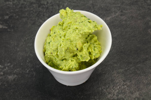 istock Avocado guacamole sauce with chili pepper 1284423521