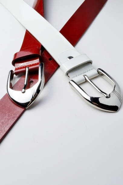 istock red and white female belt with a chrome plaque. 1284424746