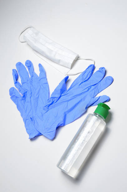 istock Sanitizer gel, face mask, gloves. 1284424749