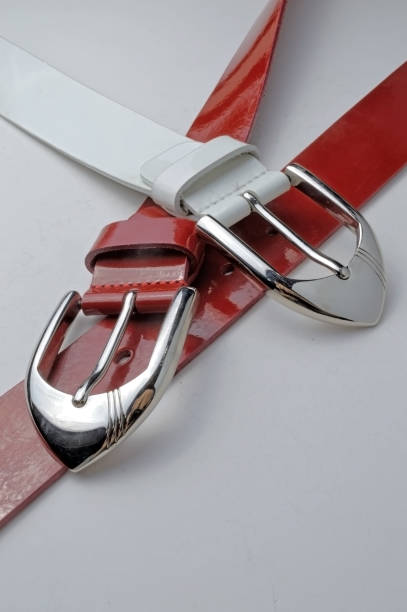 istock red and white female belt with a chrome plaque. 1284424752