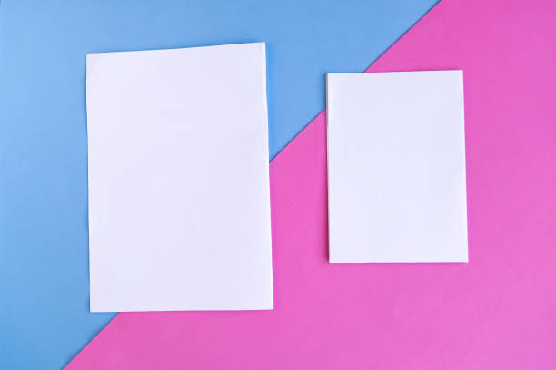 istock Two white mockup blanks on color geometric background, copy space for the text 1284425258