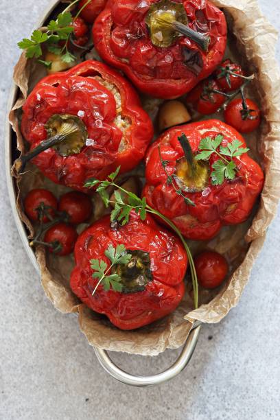 istock Oven backed red paprika   stuffed  meat and vegetables. 1284425578