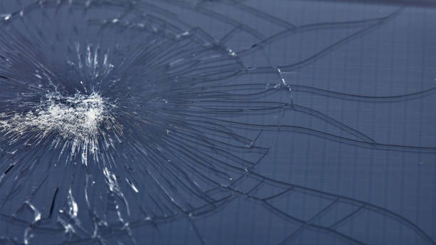 istock Broken glass - white lines on black background, design element. touch screen smartphone with broken screen 1284427515