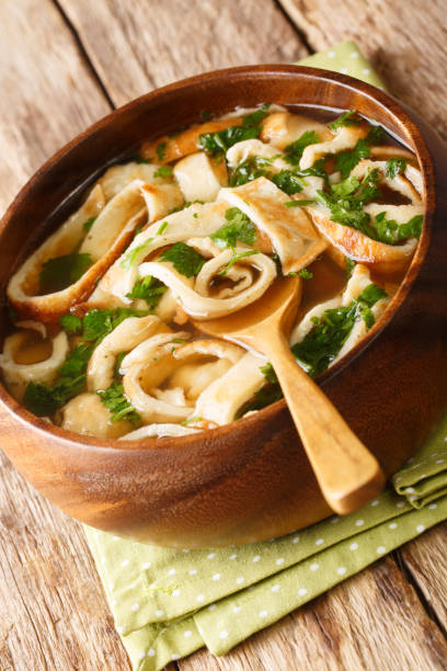 istock Frittatensuppe sliced pancake soup close-up in a plate. vertical 1284429383