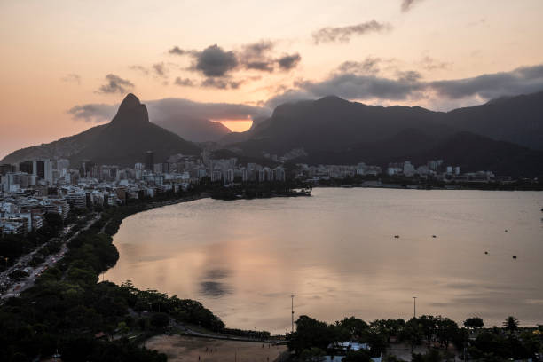 istock View to city lagoon and beautiful sunset clouds behind mountains 1284432427