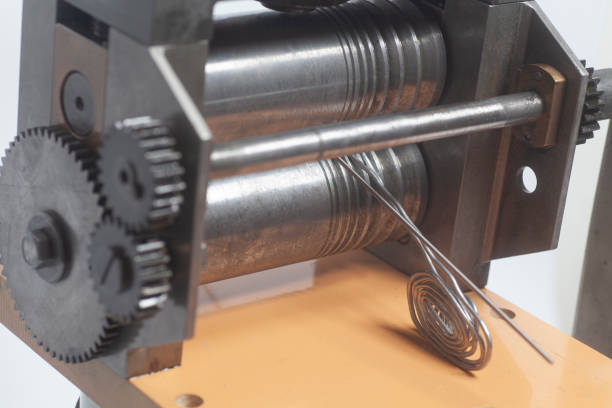 istock Jewelry rolling mill tool press rolling of a silver wire 1284435968