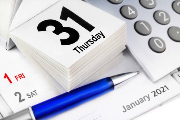 istock December 31 calendar and calculator 2020 and 2021 1284437019