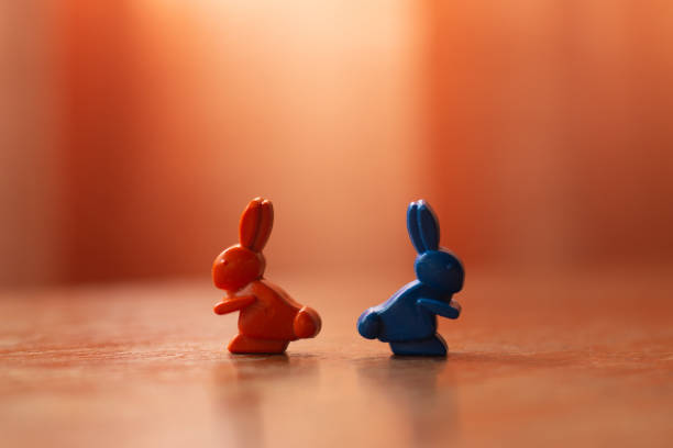 istock Figures of hares, symbolizing discord and conflict 1284438025