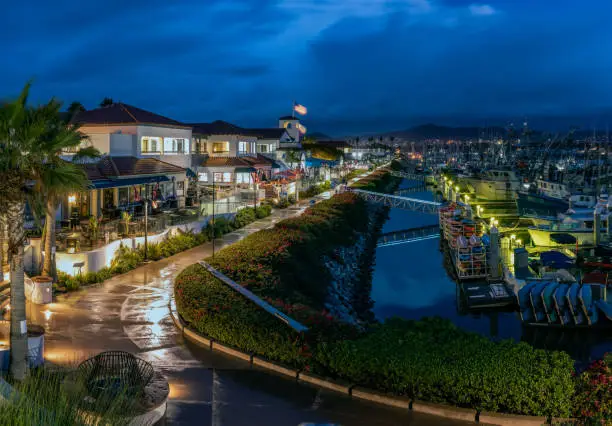 Photo of Oceanfront shopping under ominous overcast clouds.