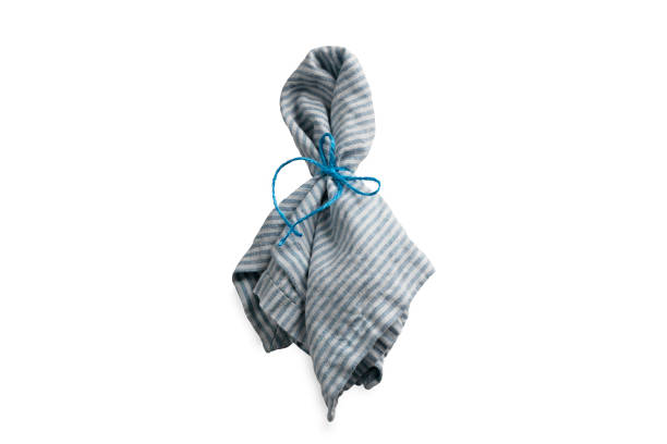 istock Striped light blue table setting napkin tied with blue jute rope. 1284440306