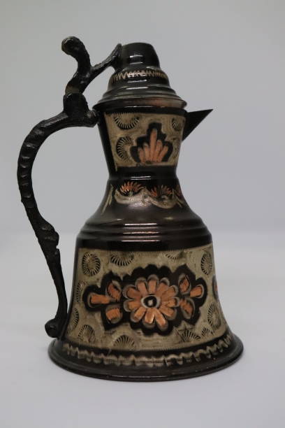 istock Middle East culture, made of copper and elaborately processed jar, water container 1284444541