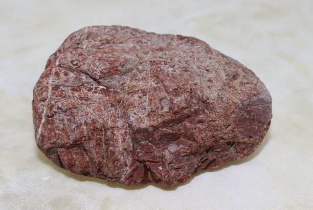 istock natural sea stone, red in color 1284445656