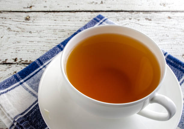 istock Green Tea In White Cup with Saucer 1284446189