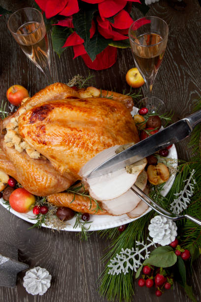 istock Carving Roasted Christmas Turkey with Grab Apples 1284450955