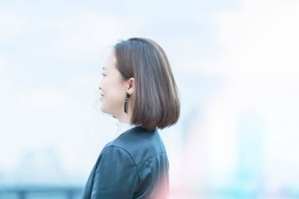 istock Woman looking into the distance 1284451892