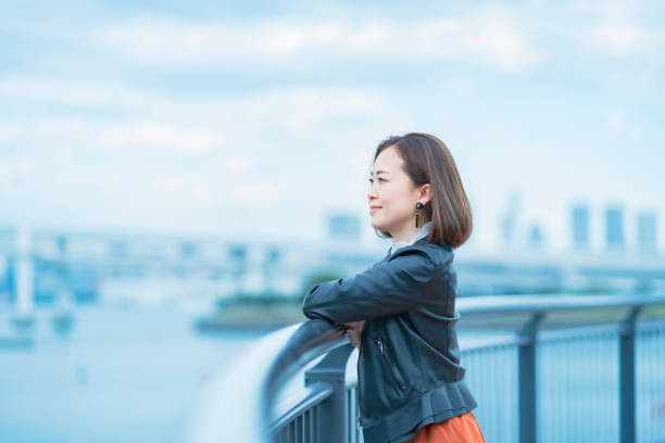 istock Woman looking into the distance 1284451920