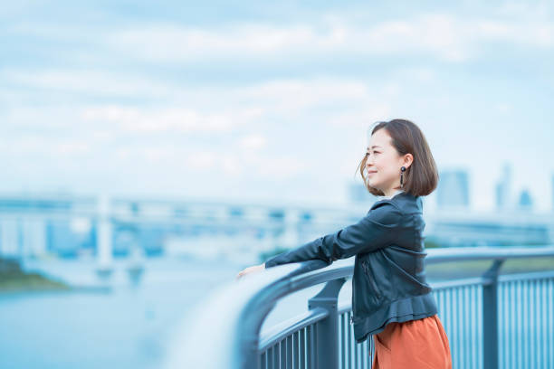 istock Woman looking into the distance 1284451985