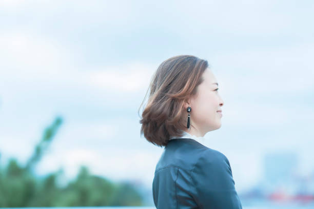 istock Woman looking into the distance 1284452005