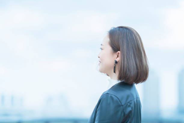 istock Woman looking into the distance 1284452026