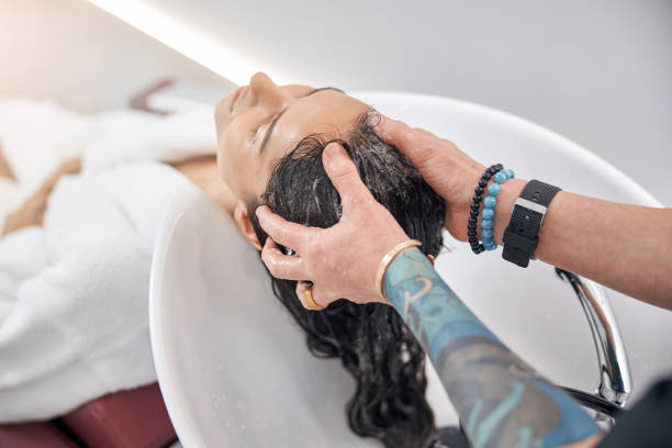 istock Barber massaging the head of the client 1284453427