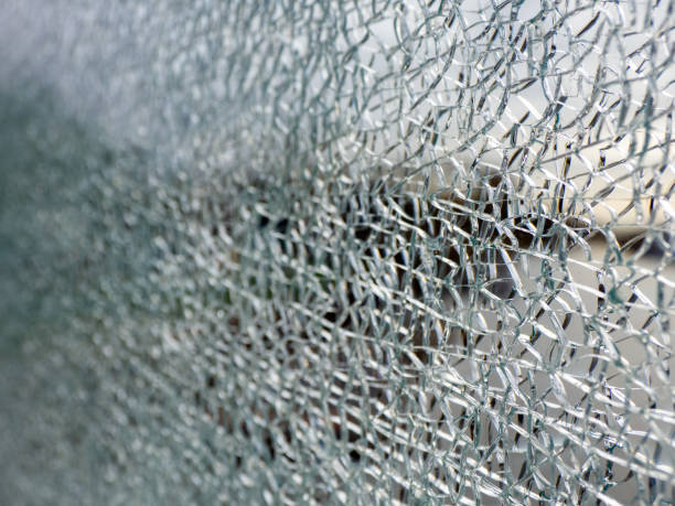 istock cracked safety glass produces a filigree pattern 1284454465