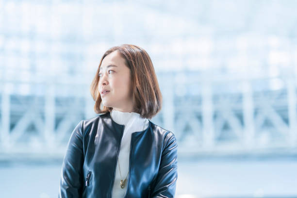 istock Casually dressed asian business woman 1284454655
