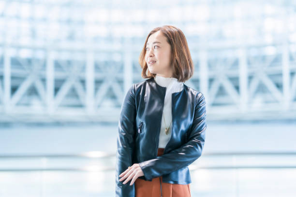 istock Casually dressed asian business woman 1284455172
