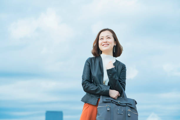 istock casually dressed asian business woman 1284455336