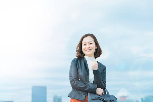 istock casually dressed asian business woman 1284455369