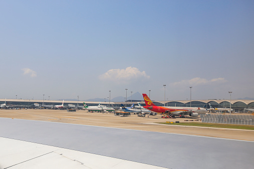 Hong Kong Airlines Airbus A330-300 aircraft B-LNP parked at gate at Hong Kong  International Airport in April 2015.