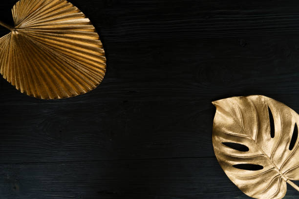 istock Golden tropial leaves 1284456473