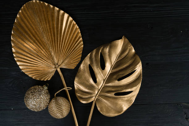 istock Golden tropial leaves 1284456546