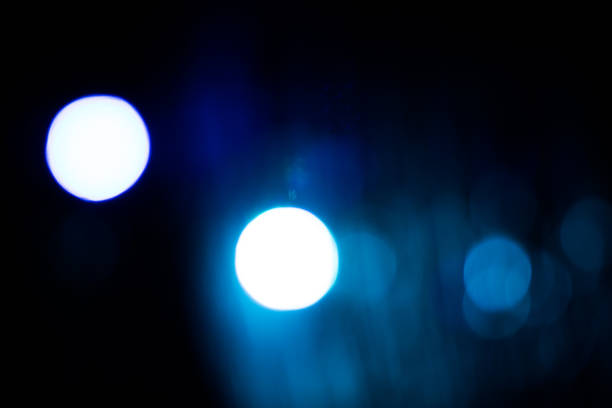 istock An abstract background image of glowing lights in the dark. 1284456859