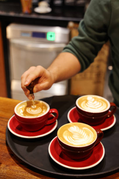 Barista make coffee cup latte art