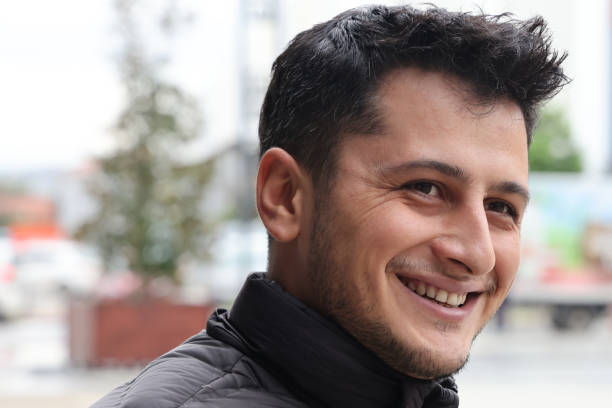 istock Handsome man portrait outdoors 1284458377