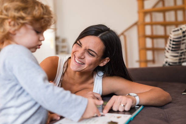 istock Young mother looking lovingly at her child 1284462796