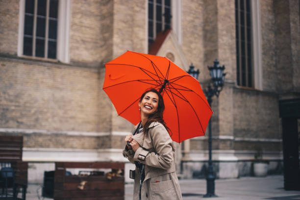 istock Hipster woman walking down the street. 1284468850