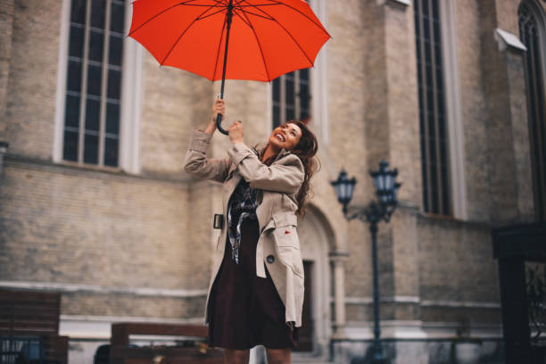 istock Young girl standing on the wind. 1284468861