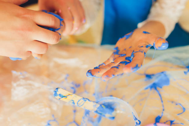 istock Ingredient for make home made Toy Called Slime, Teenager having fun and being creative homemade slime. Selective focus on Slime. 1284472982