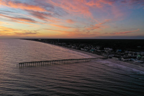 Looking back at the Island as the glow of the setting sun lights the sky.
