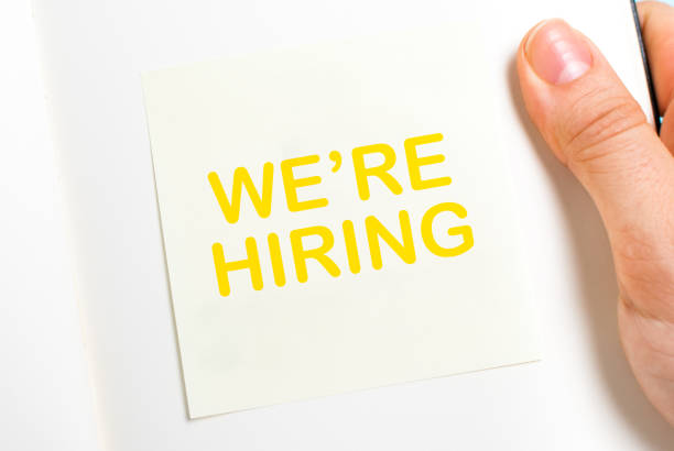 istock We are hiring yellow message text on adhesive notes and notebook. Job board design, template. Concept of recruitment and job search. 1284480652