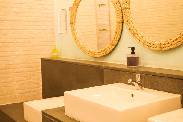 istock Orange light of bathroom sanitary ware luxurious. interiors concept. 1284489270