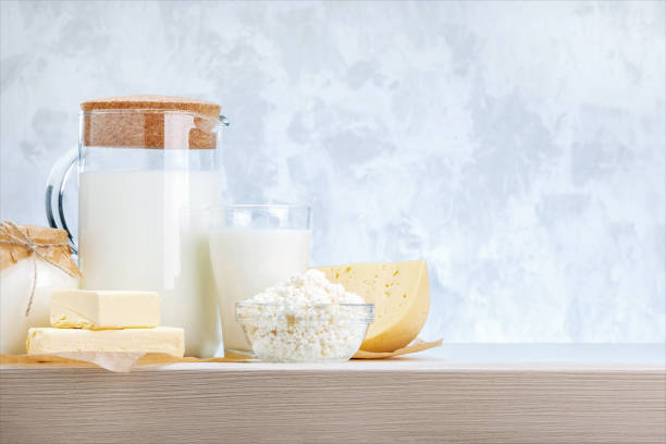 istock Various dairy products on wooden table with copy space. 1284491017